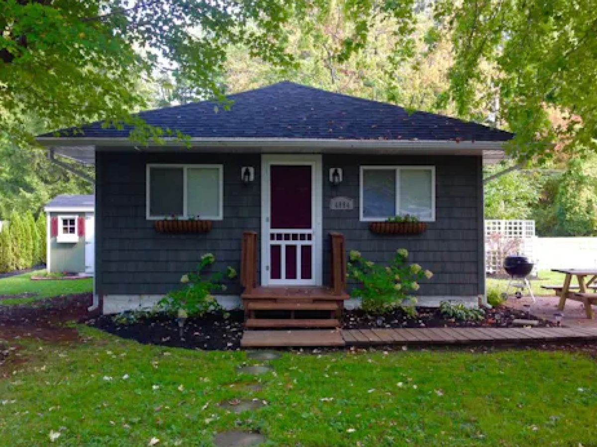 small grey cottage