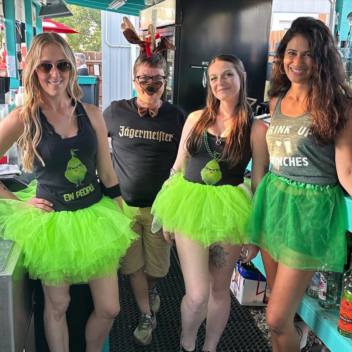 Bartenders dressed up for Christmas in July.