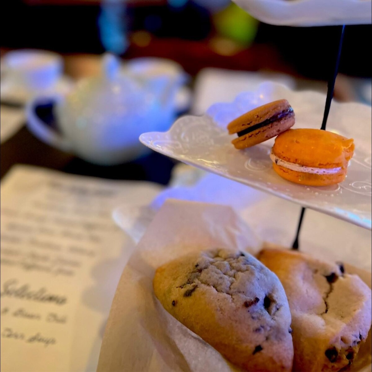 Desserts and teapot for a tea party.